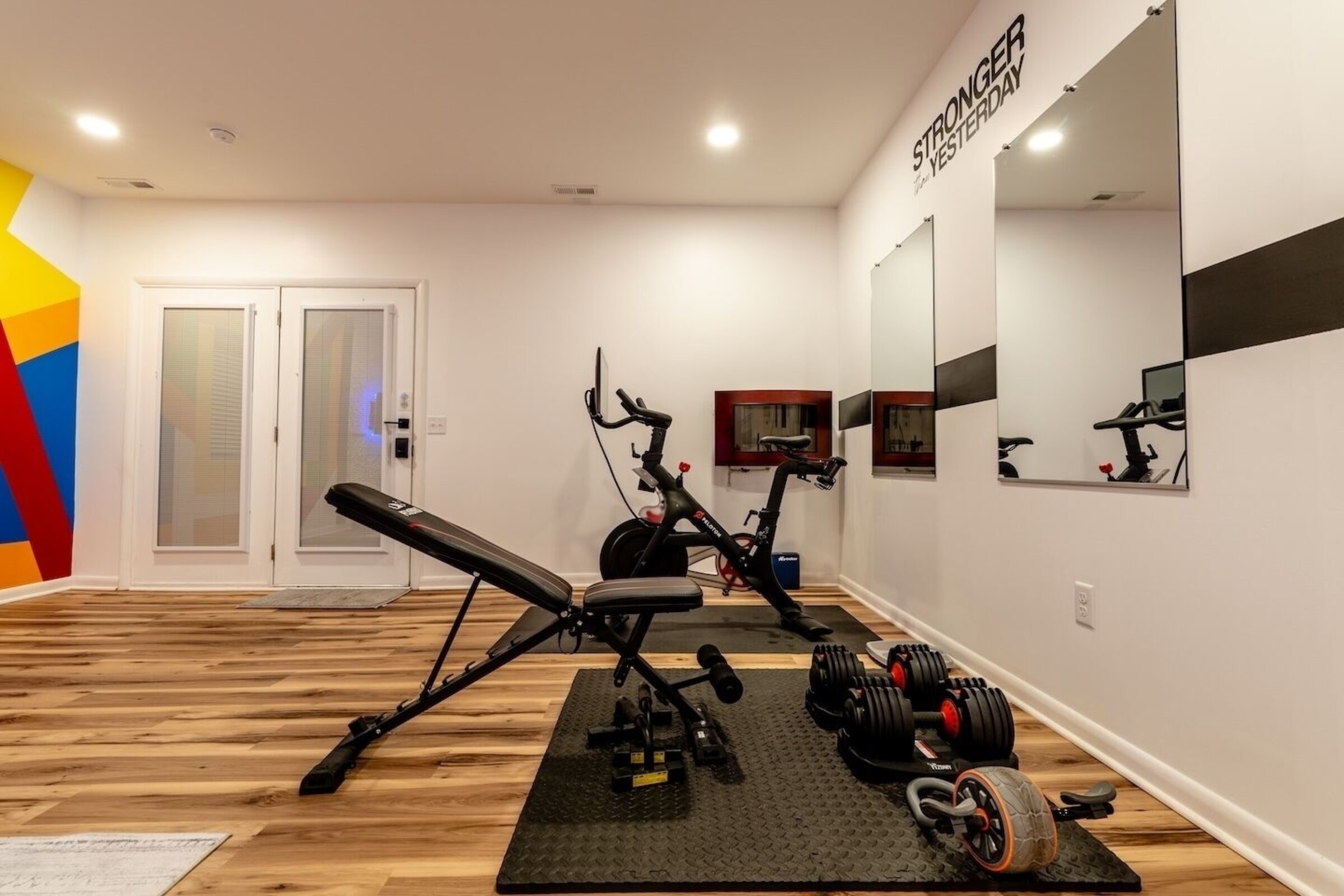 Home gym mirror wall at Cedar Escape